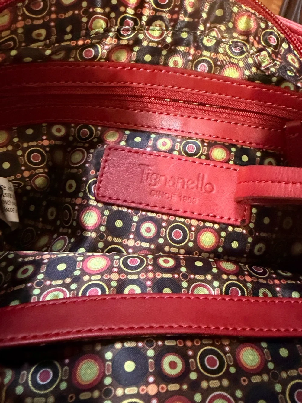 Red Leather Shoulder Bag with Gold Medallion Accents
